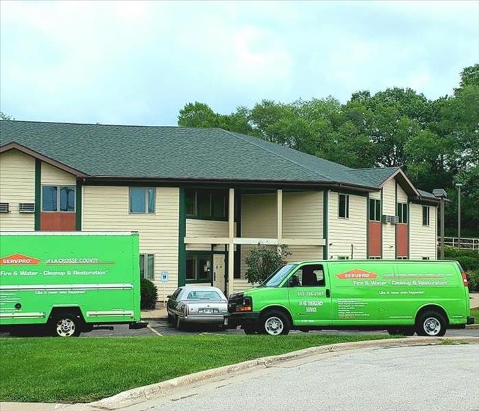SERVPRO trucks in front of apartment building