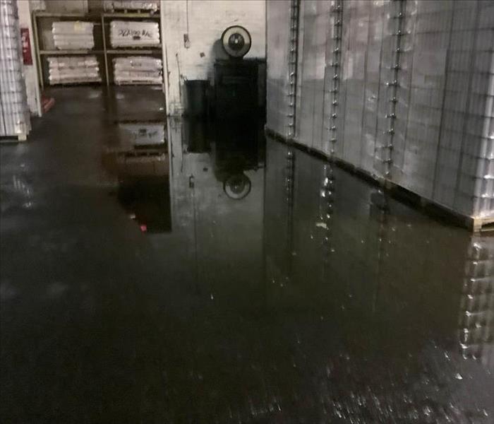 Standing water in a warehouse.